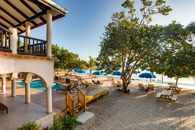 Beach loungers and the property along the sand