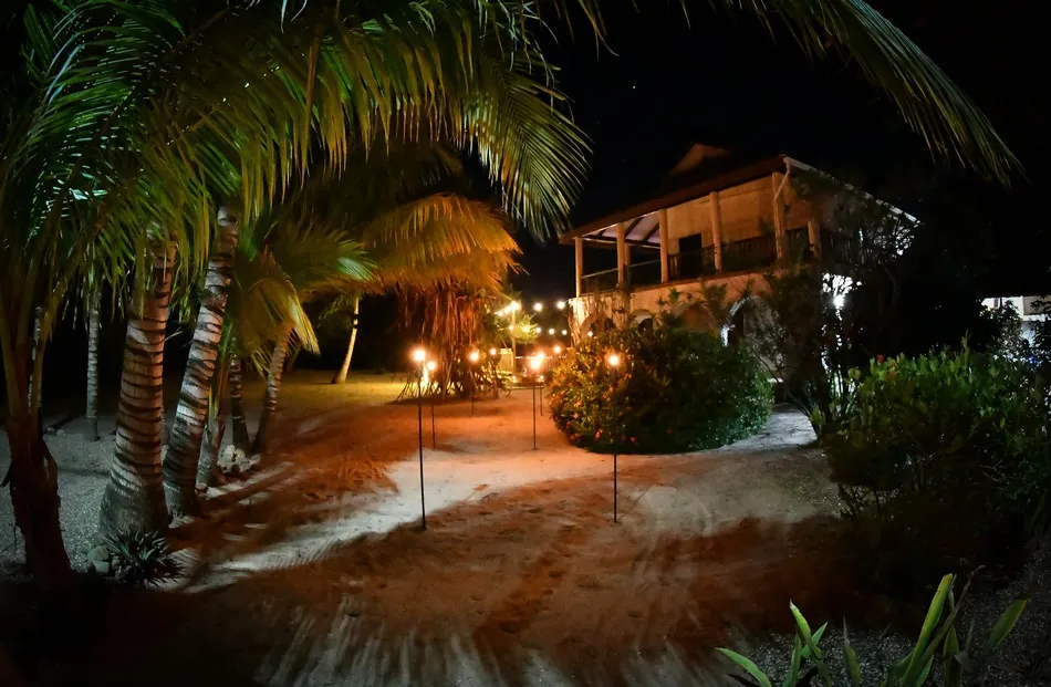 The lantern-lit path through the resort at night